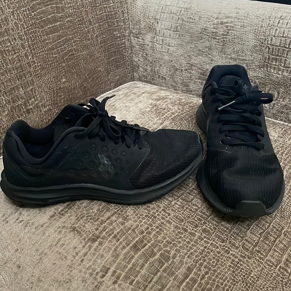 Nike woman’s running shoes.